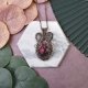 Miedziany wisiorek wire wrapping z rodonitem #435