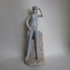 Cowboy w stylu Nao Lladro -niespotykana porcelanowa figurka 23 cm wysokości