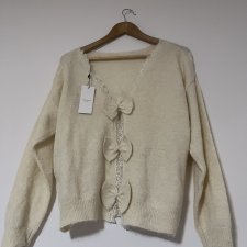 Sweter z kokardkami Axara Paris